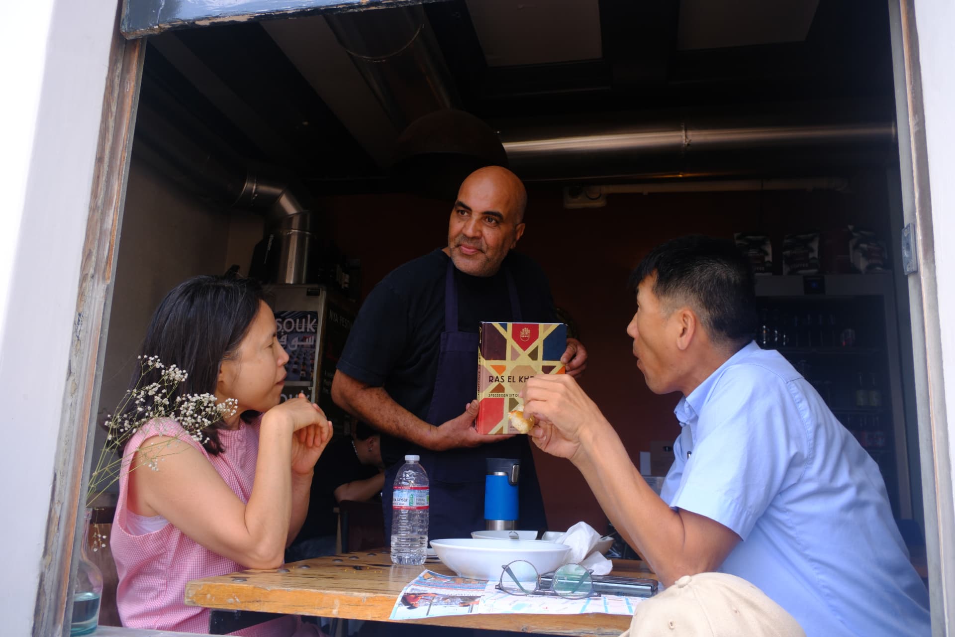 Guests sharing a meal at the counter